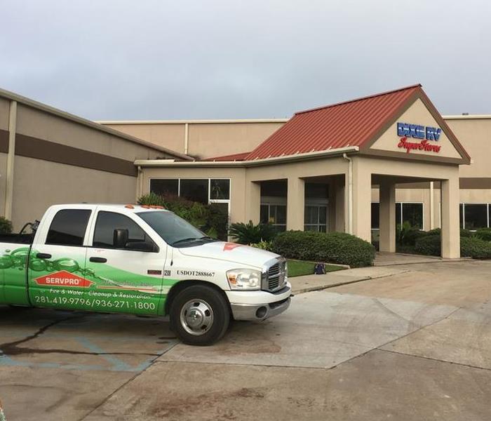 SERVPRO truck parked outside a business.