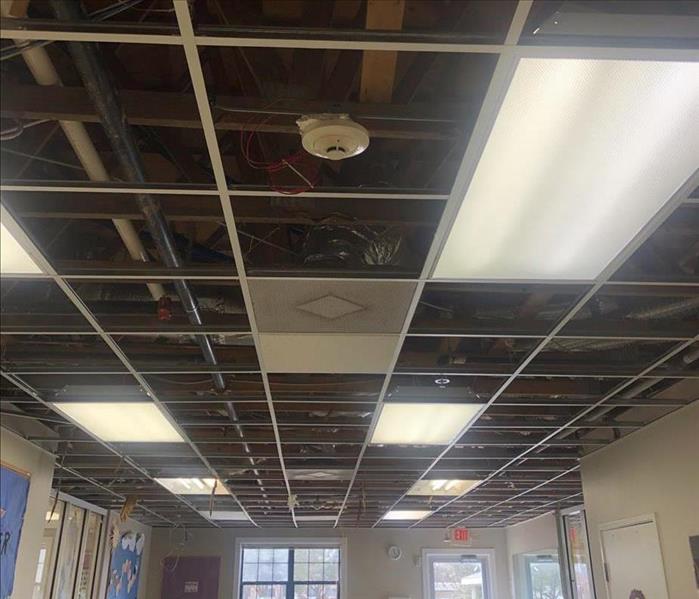 Dropped ceiling tiles removed.